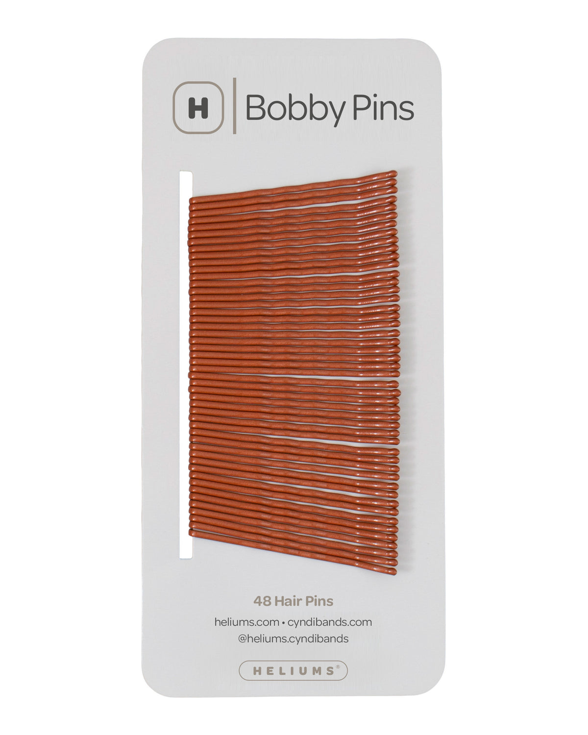 Packaging of Heliums brand 2-inch wavy copper color bobby pins, displaying multiple pins on white card with the brand logo and name.
