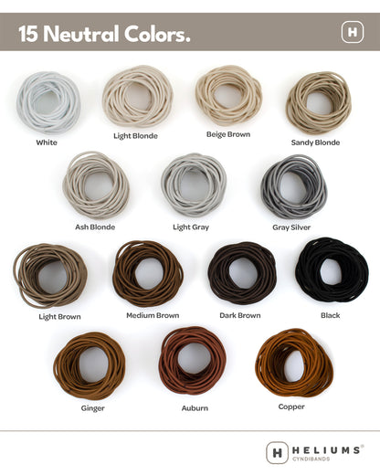 Heliums hair ties color chart showing 15 neutral colors, including White, Light Blonde, Beige Brown, Sandy Blonde, Ash Blonde, Light Gray, Gray Silver, Light Brown, Medium Brown, Dark Brown, Black, Ginger, Auburn, and Copper, arranged in a grid with labels on a white background.