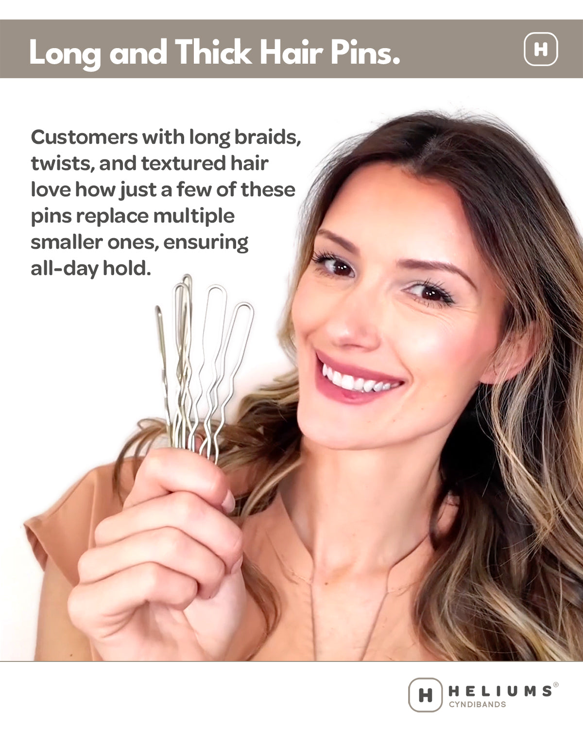 A smiling woman with long brown hair holds several Heliums brand long and thick hair pins against a white background with promotional text on a gray banner at the top.