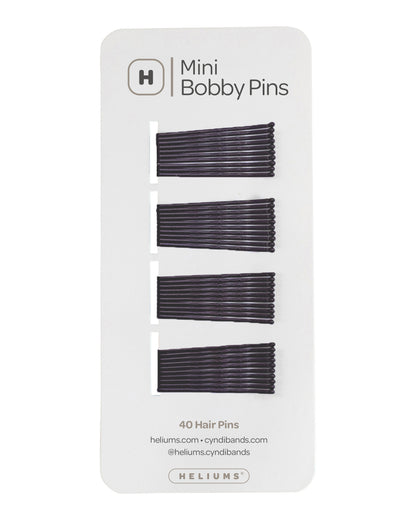 Helium Mini Bobby Pins set of 40 hair pins on a white backing card, showing four rows of dark brown metal bobby pins.