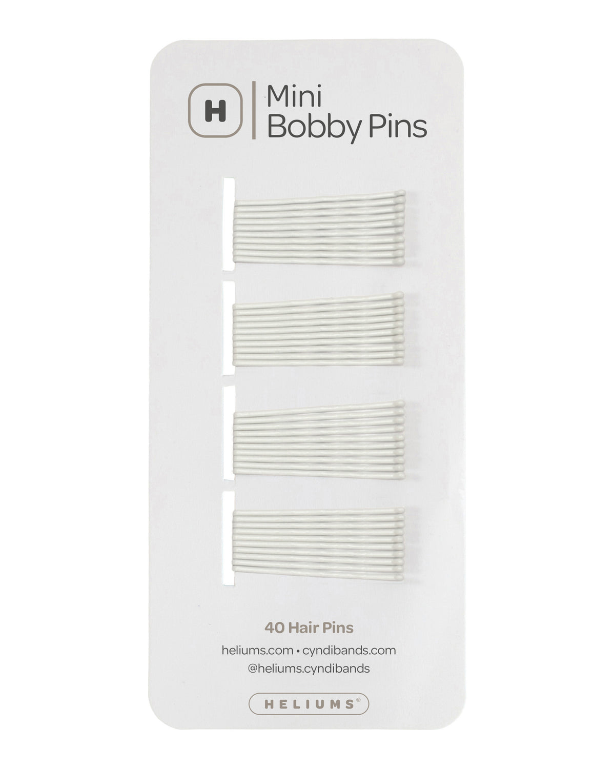 Heliums 40 mini bobby pins on a white display card, showing four sets of white hair pins.