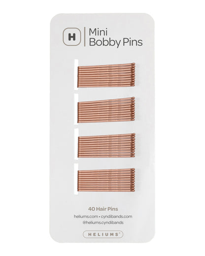 Helium Mini Bobby Pins set of 40 hair pins on a white backing card, showing four rows of ginger color metal bobby pins.