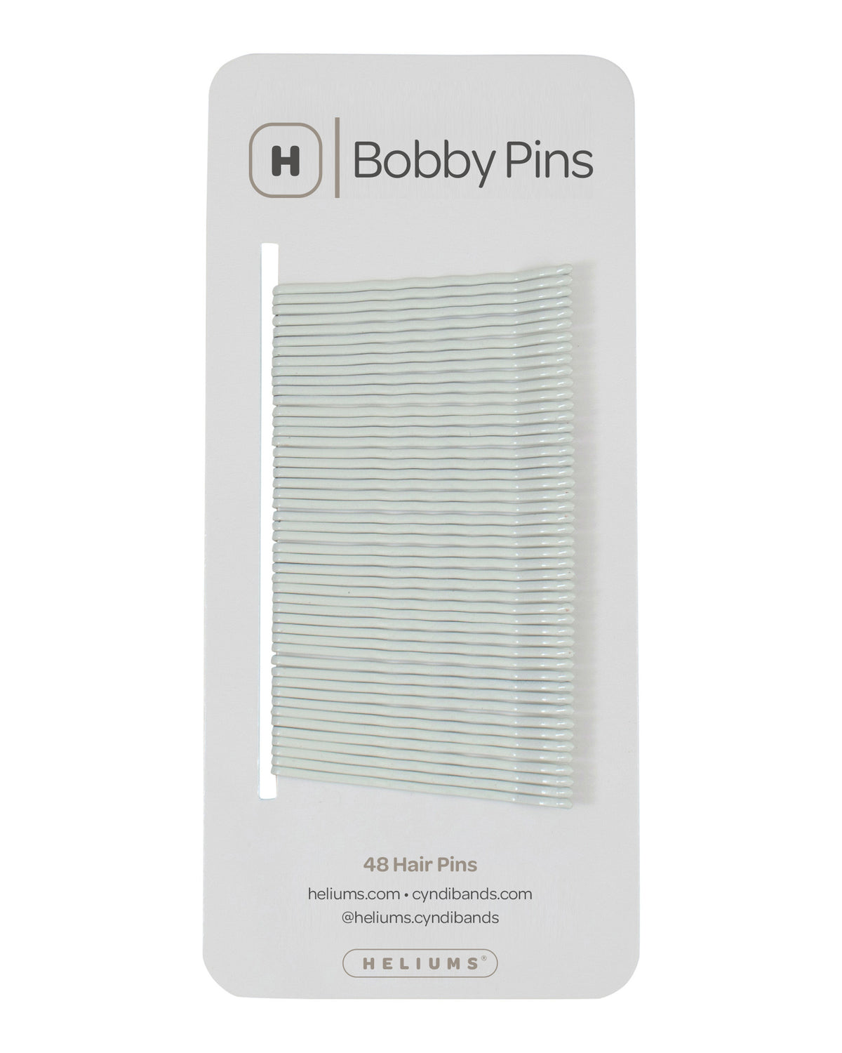 Packaging of Heliums brand 2-inch wavy white color bobby pins, displaying multiple pins on white card with the brand logo and name.